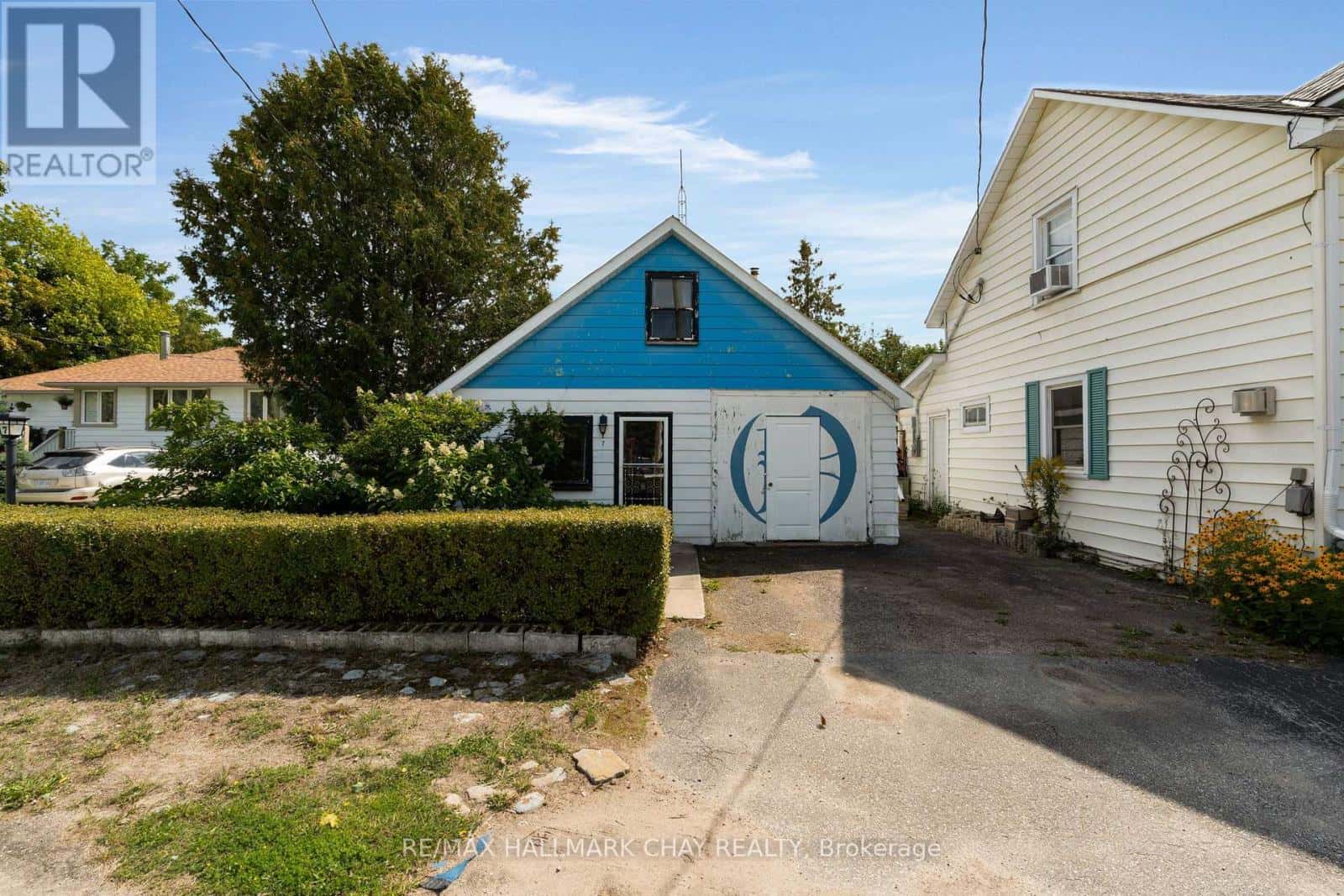 7 CAROLINE STREET E — Clearview (Creemore), Ontario - Photo 2 of 34