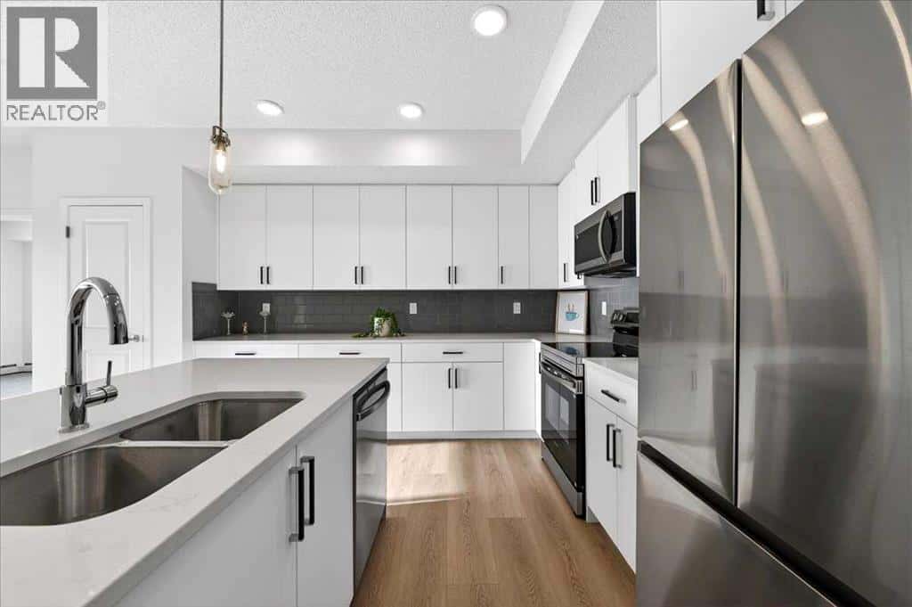 325, 245 Edith Place NW — Calgary - Photo 5 of 45