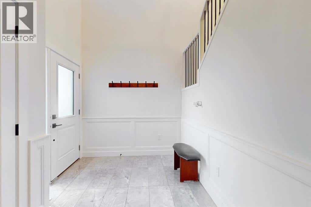 714 Mandalay Link — Carstairs, Alberta - Photo 4 of 39