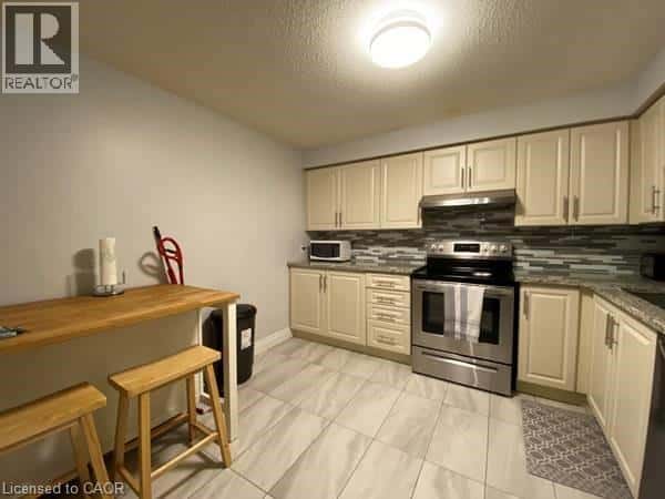 Kitchener — Kitchener - Photo 5 of 13