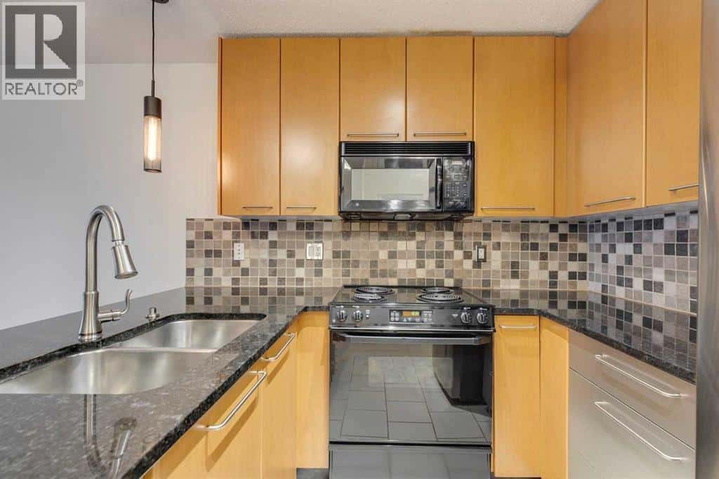 106, 35 Richard Court SW — Calgary, Alberta - Photo 4 of 27