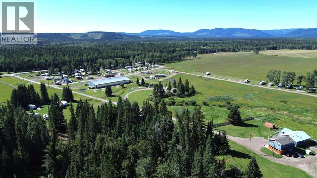 84038 591 Highway — Caroline, Alberta - Photo 2 of 49