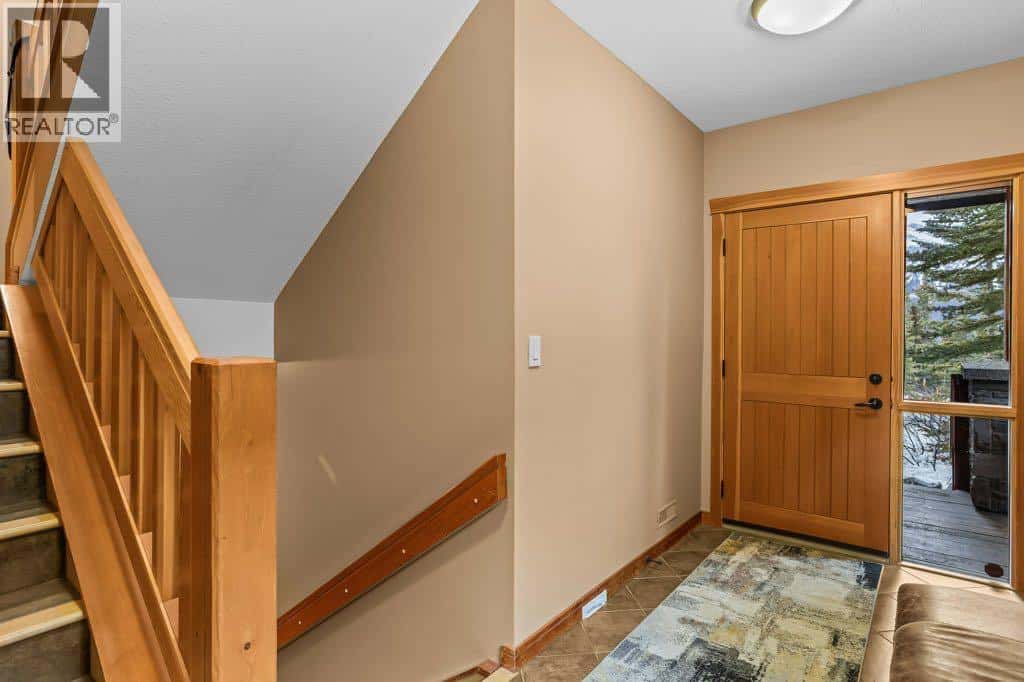 104 Stone Creek Place S — Canmore, Alberta - Photo 3 of 44