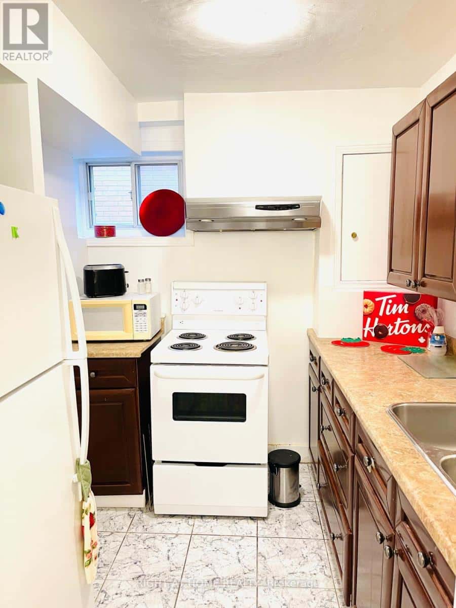 A - 73 TWENTY FOURTH BSMT STREET — Toronto (Long Branch) - Photo 4 of 5