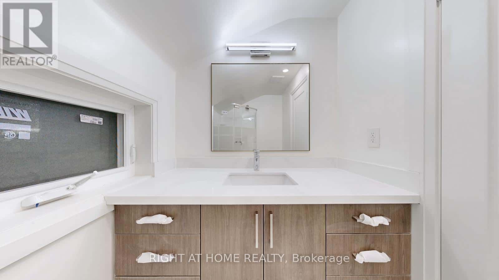 UNIT 3 - 61 GLADYS ROAD — Toronto (Highland Creek) - Photo 2 of 10