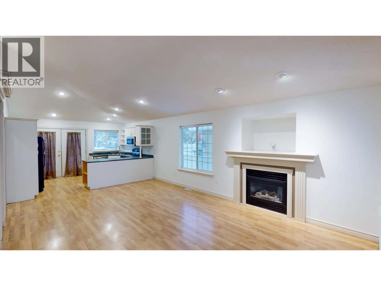 A 10007 111 AVENUE — Fort St. John, British Columbia - Photo 2 of 35