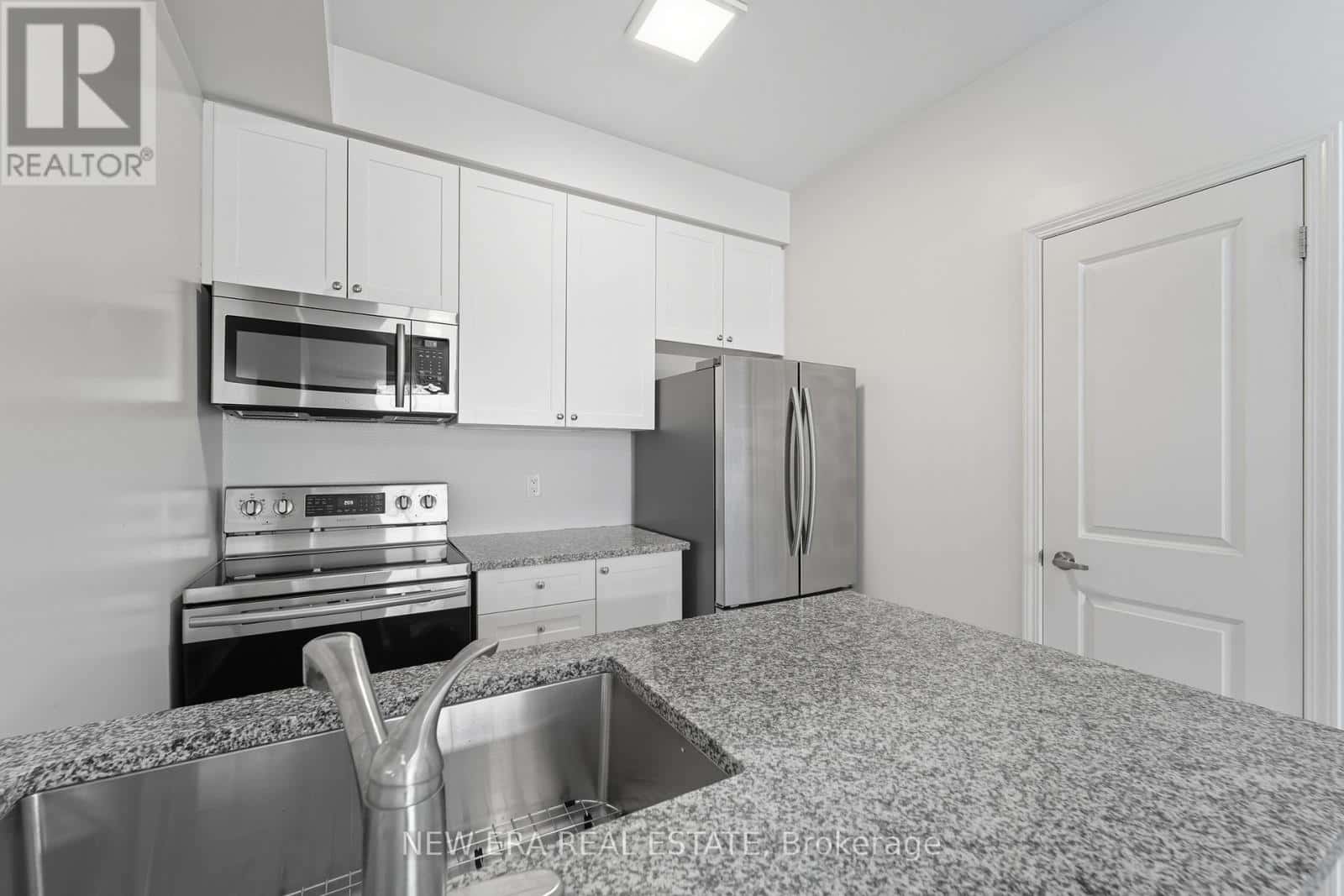 120 - 80 ASPEN SPRINGS DRIVE — Clarington (Bowmanville), Ontario - Photo 5 of 34