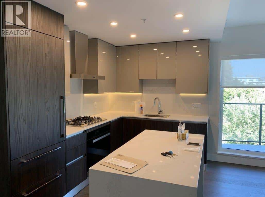 303 488 W 58 AVENUE — Vancouver - Photo 3 of 14