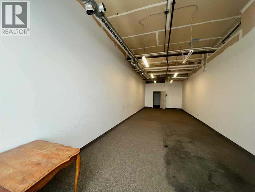 105, 1010 Railway Street — Crossfield, Alberta - Photo 3 of 9