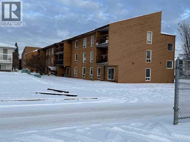 48 SUITES, 4607/4609 51 Avenue — Whitecourt, Alberta - Photo 4 of 18