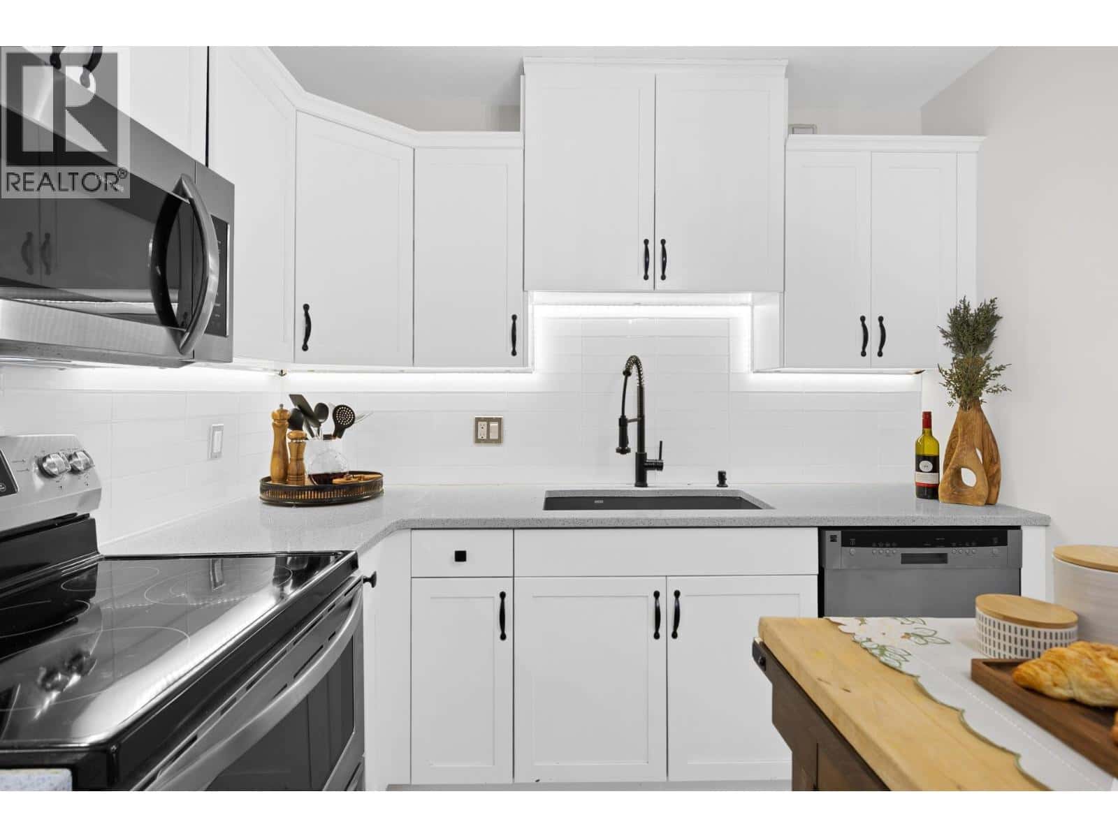 303 Whitman Road Unit# 106 — Kelowna - Photo 4 of 54