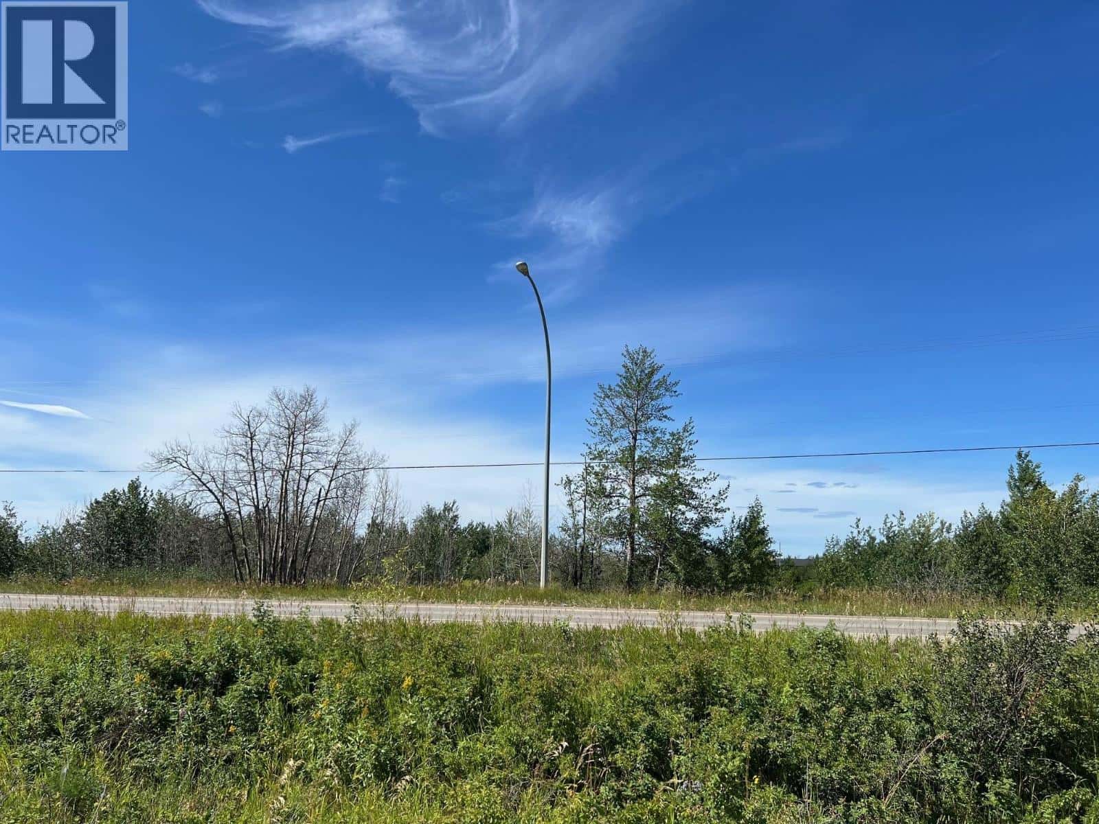 8511 NORTHERN LIGHTS DRIVE — Fort St. John, British Columbia - Photo 2 of 9