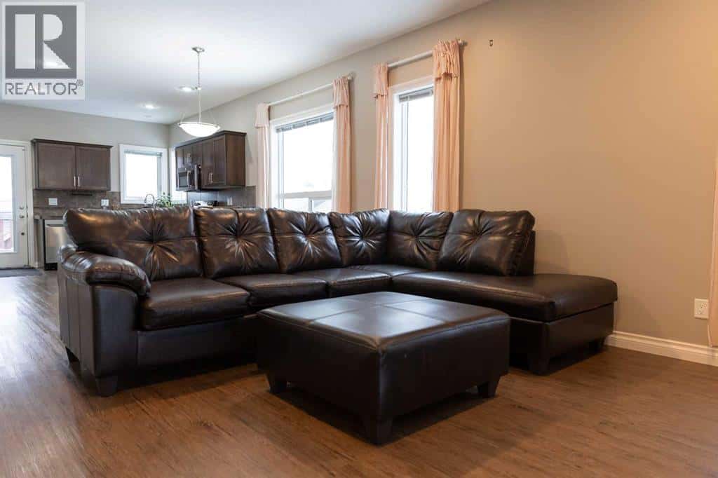 192 Cedar Square — Blackfalds, Alberta - Photo 3 of 32