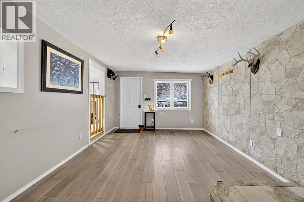 220 5 Street NW — Sundre, Alberta - Photo 3 of 24