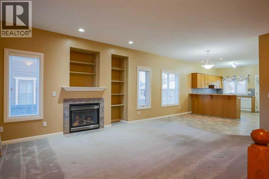 1105 Hammond Avenue — Crossfield, Alberta - Photo 3 of 32