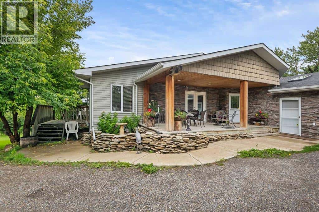 33194 Twp Rd 284 — Rural Rocky View County, Alberta - Photo 2 of 46