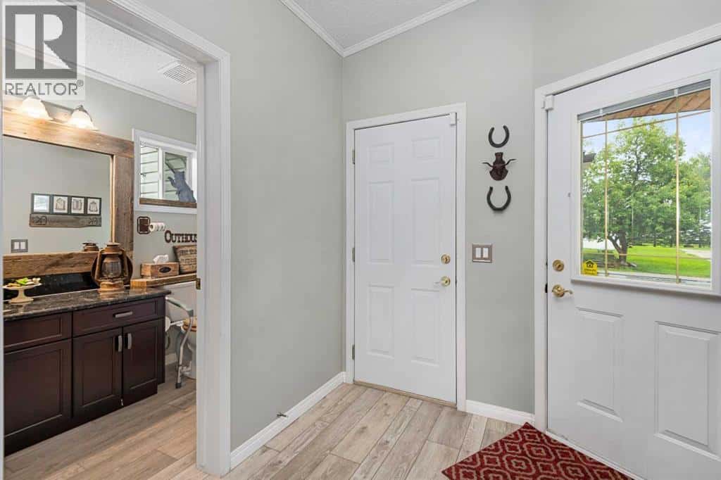 33194 Twp Rd 284 — Rural Rocky View County, Alberta - Photo 3 of 46