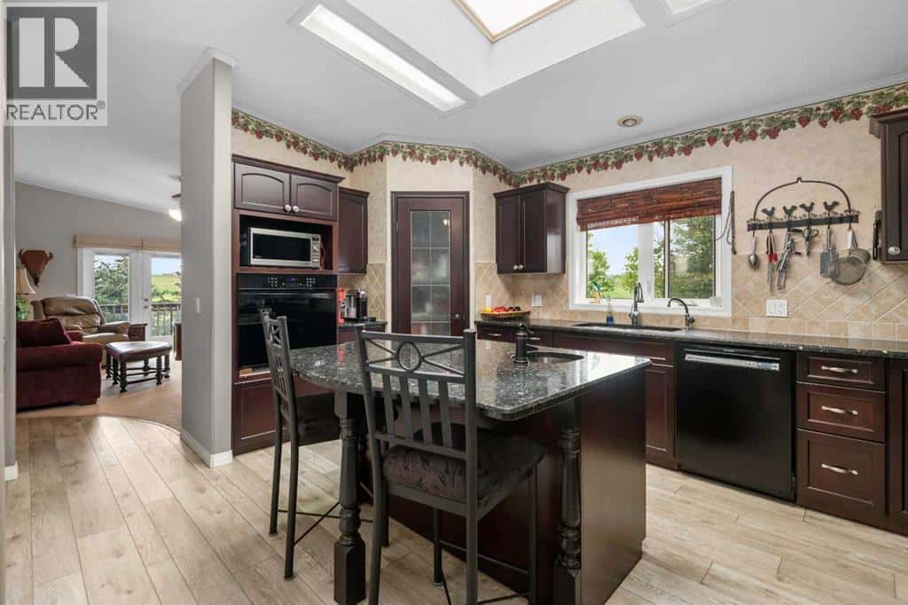 33194 Twp Rd 284 — Rural Rocky View County, Alberta - Photo 5 of 46