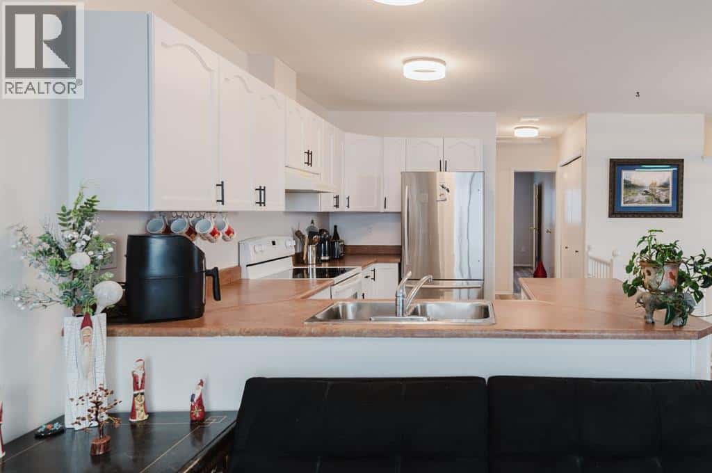 B, 9700 95 Avenue — Sexsmith, Alberta - Photo 5 of 27