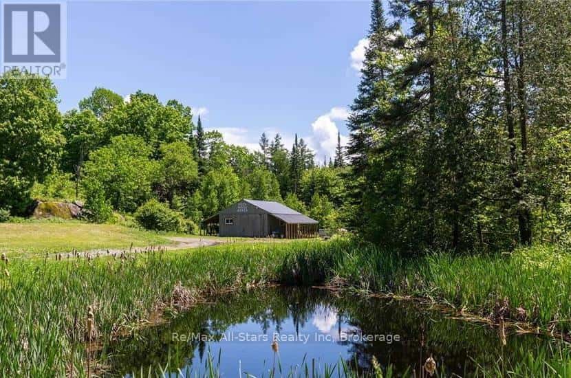 410 ETWELL ROAD — Huntsville (Stisted), Ontario - Photo 4 of 40