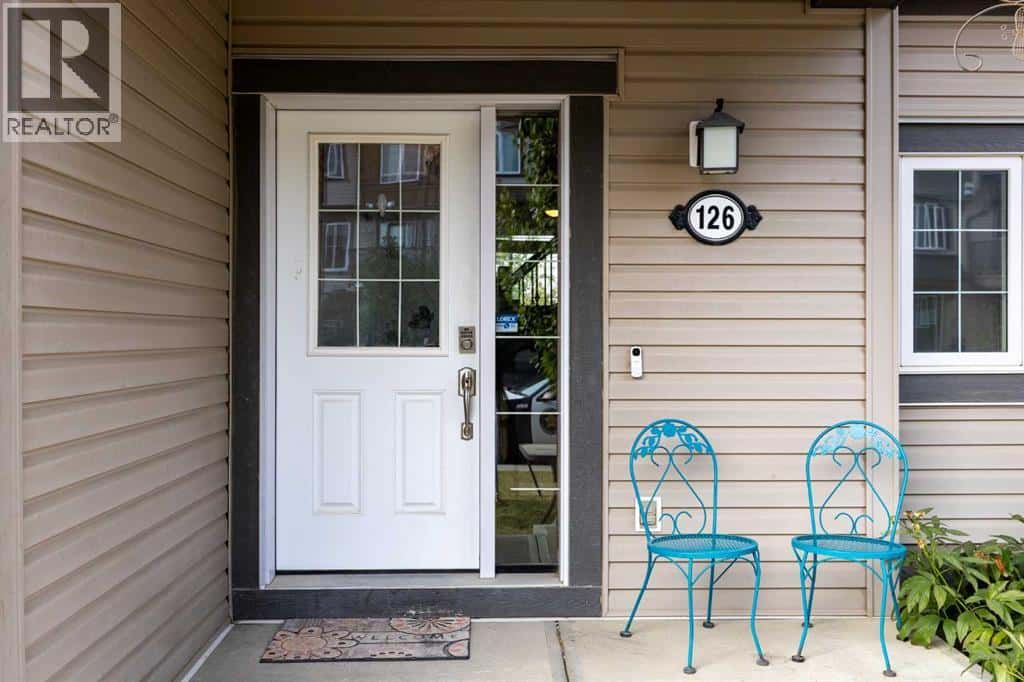 126 Windstone Avenue SW — Airdrie, Alberta - Photo 3 of 33