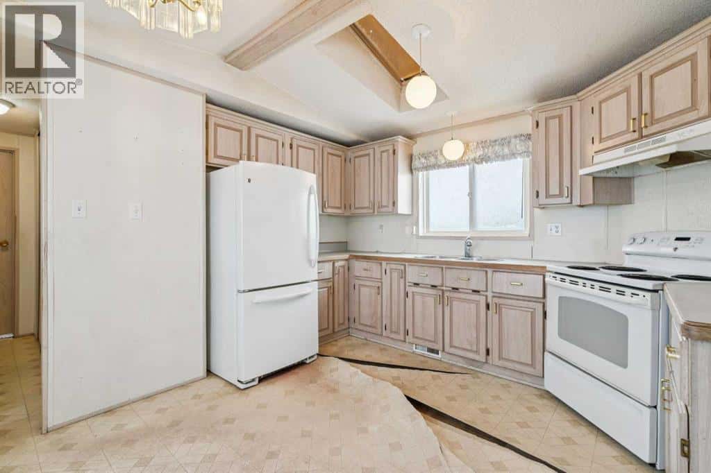 428, 1101 84 Street NE — Calgary, Alberta - Photo 5 of 22