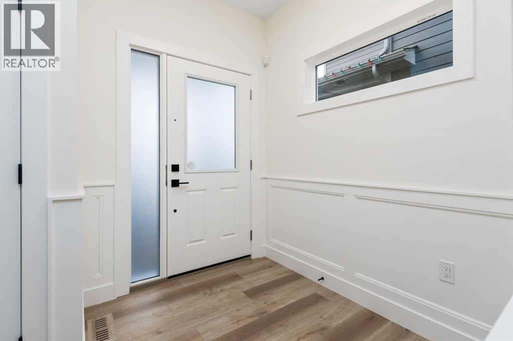 704 Mandalay Boulevard — Carstairs, Alberta - Photo 2 of 38