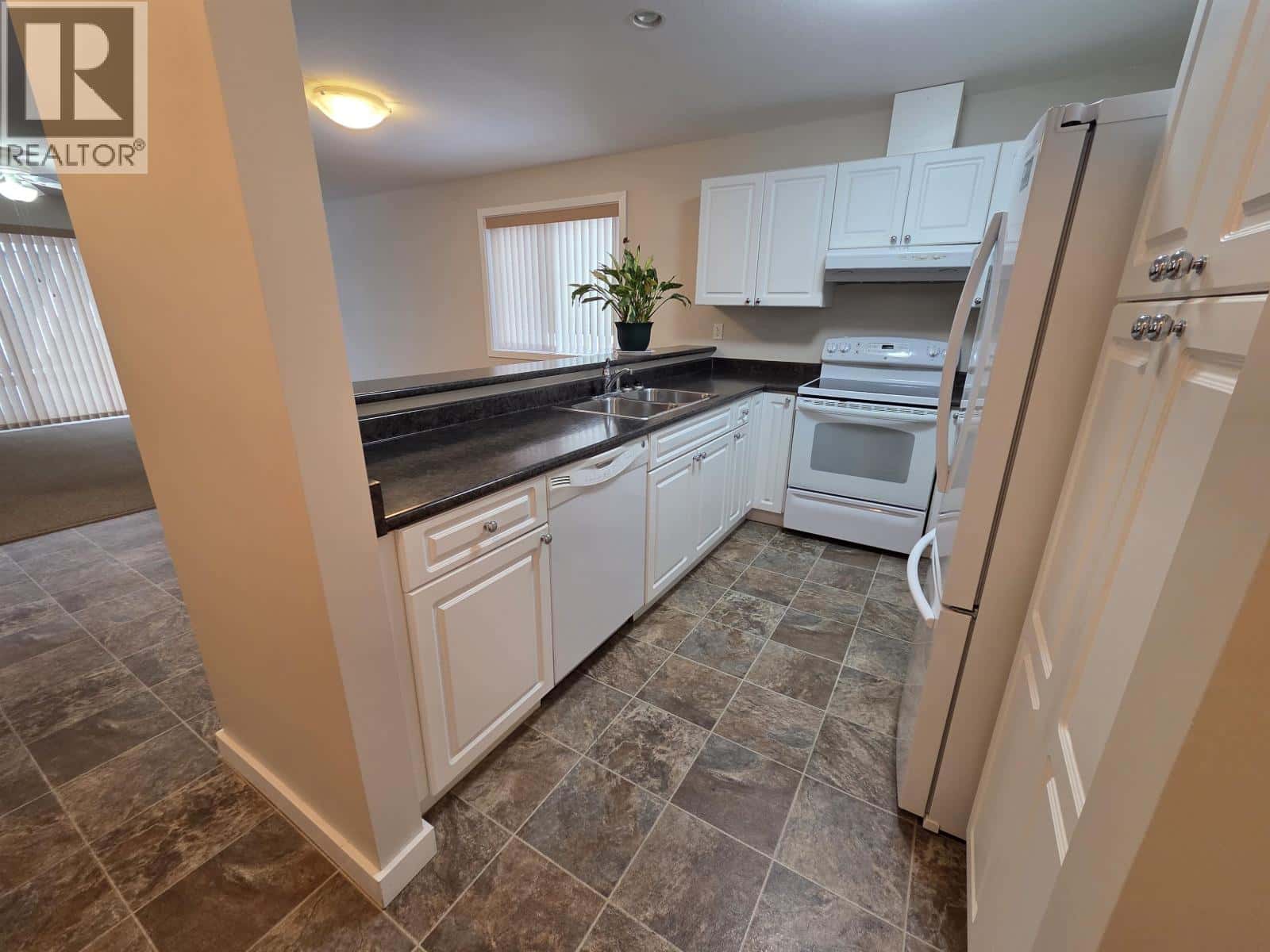 2 3404 ADAM STREET — Terrace, British Columbia - Photo 4 of 14