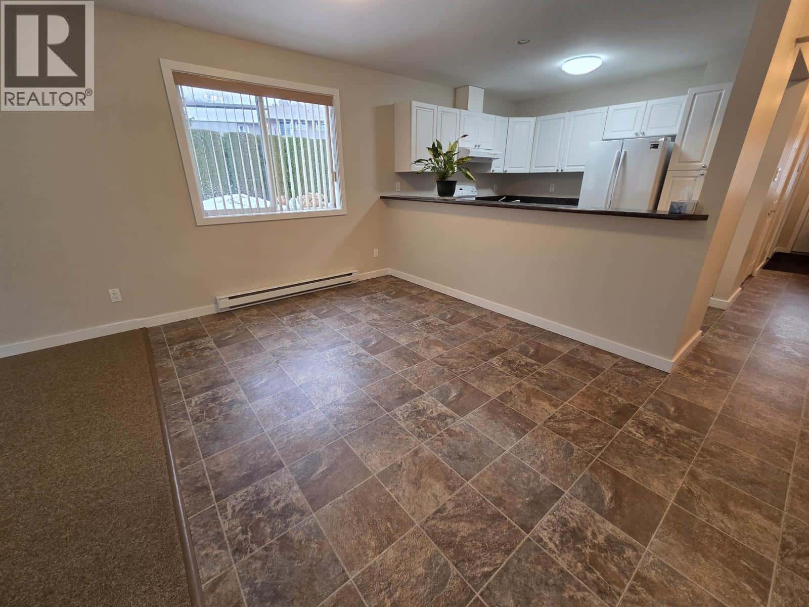 2 3404 ADAM STREET — Terrace, British Columbia - Photo 3 of 14