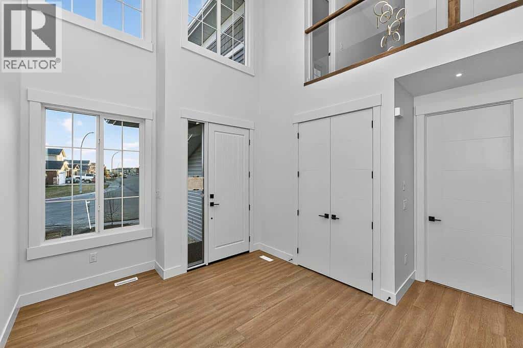 65 Lake Estate Circle — Strathmore, Alberta - Photo 3 of 48