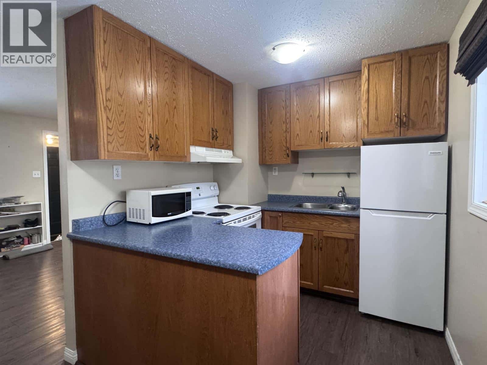 4711 HAMER AVENUE — Terrace, British Columbia - Photo 3 of 10