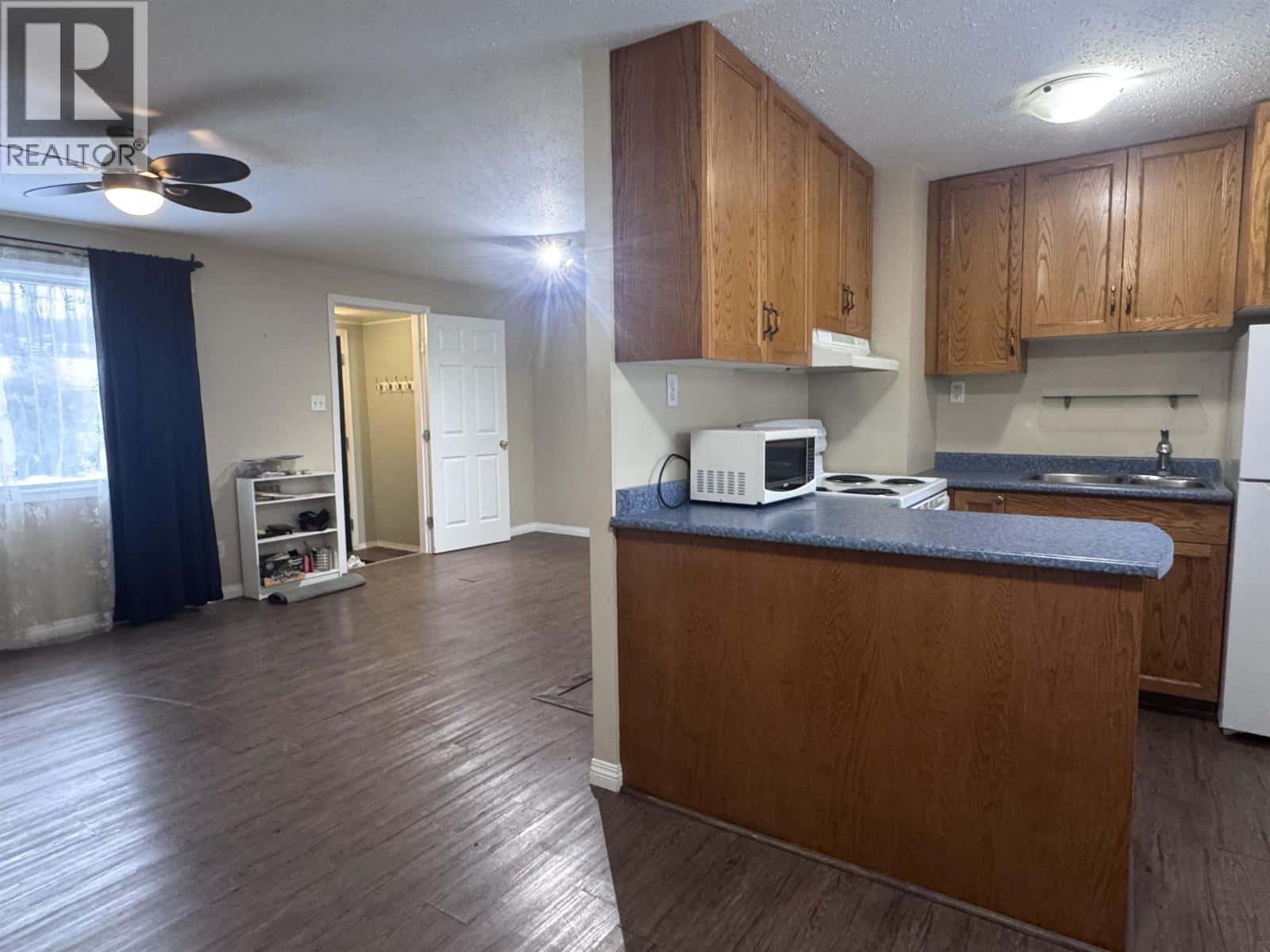 4711 HAMER AVENUE — Terrace, British Columbia - Photo 4 of 10