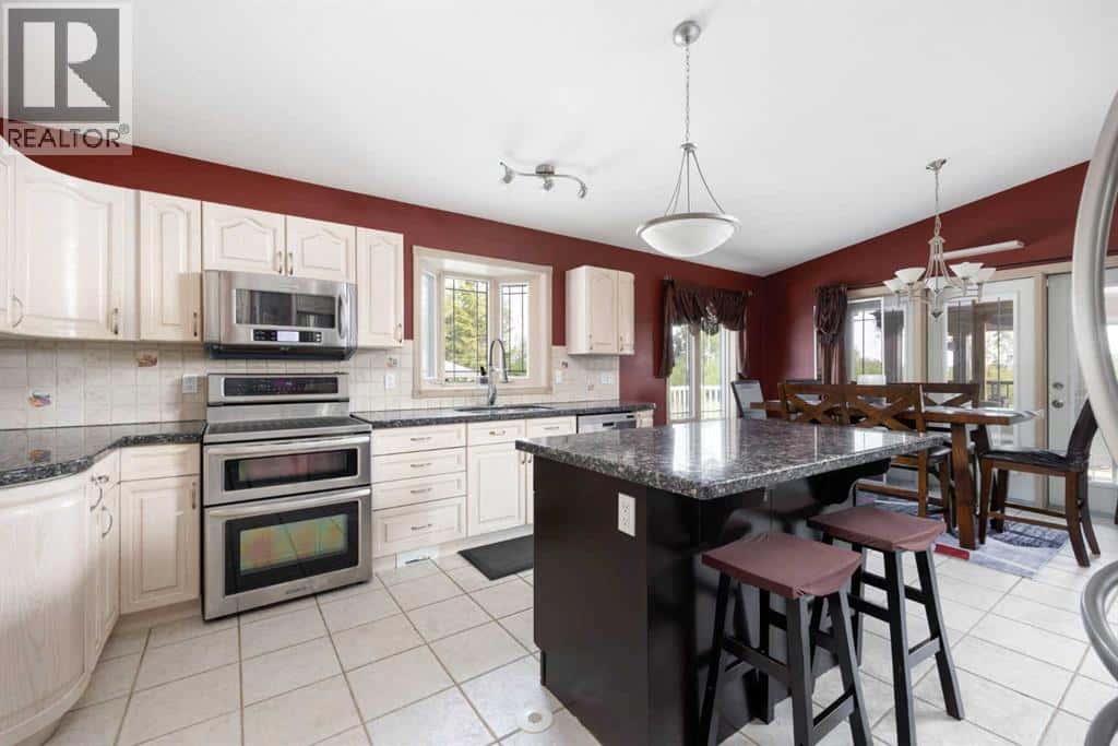 25 FREESTONE Way — Saprae Creek, Alberta - Photo 5 of 49