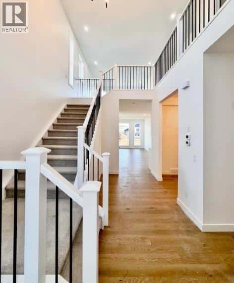 37 North Bridges Bay SW — Langdon, Alberta - Photo 5 of 33