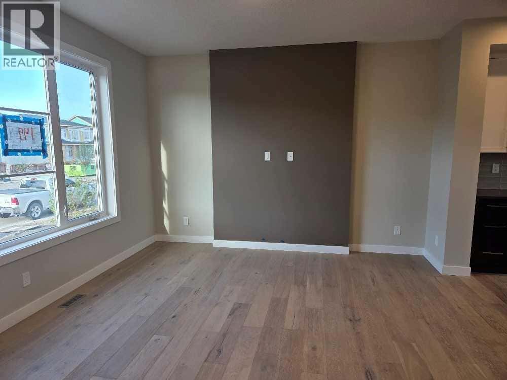 245 Cobblestone Gate SW — Airdrie, Alberta - Photo 5 of 20