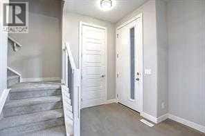 109 Cobblestone Gate SW — Airdrie, Alberta - Photo 2 of 16