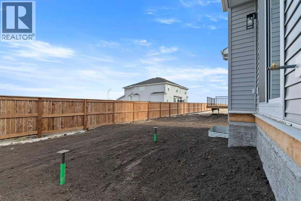 307 Kinniburgh Loop — Chestermere, Alberta - Photo 4 of 38