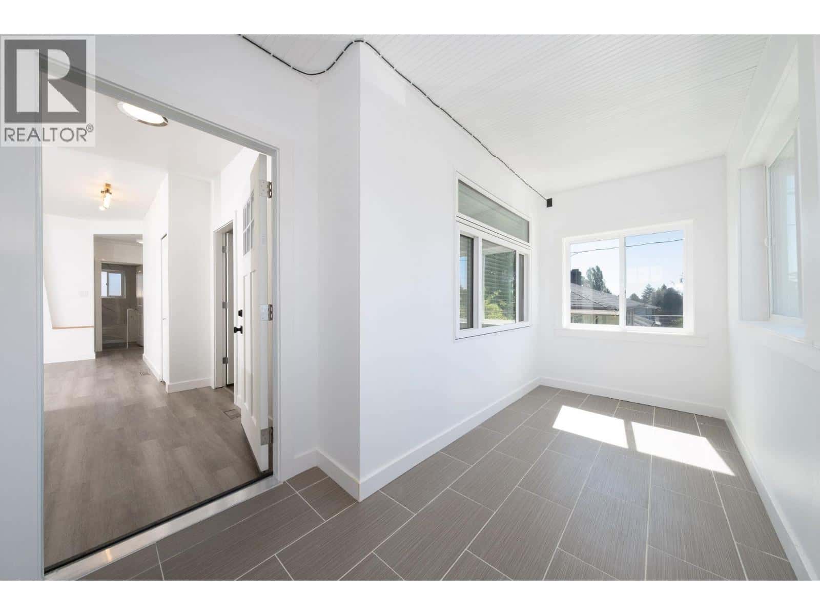 7696 DAVIES STREET — Burnaby, British Columbia - Photo 3 of 40