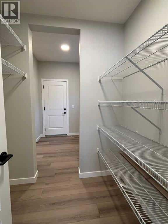 342 Baywater Common SW — Airdrie, Alberta - Photo 5 of 24