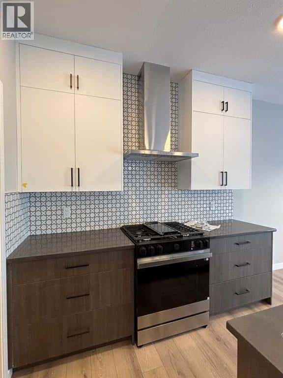 342 Baywater Common SW — Airdrie, Alberta - Photo 2 of 24