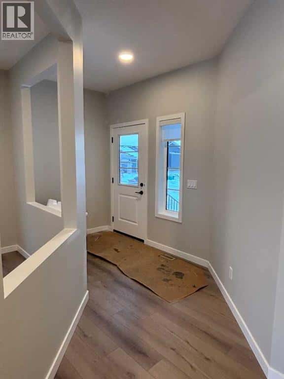 342 Baywater Common SW — Airdrie, Alberta - Photo 3 of 24