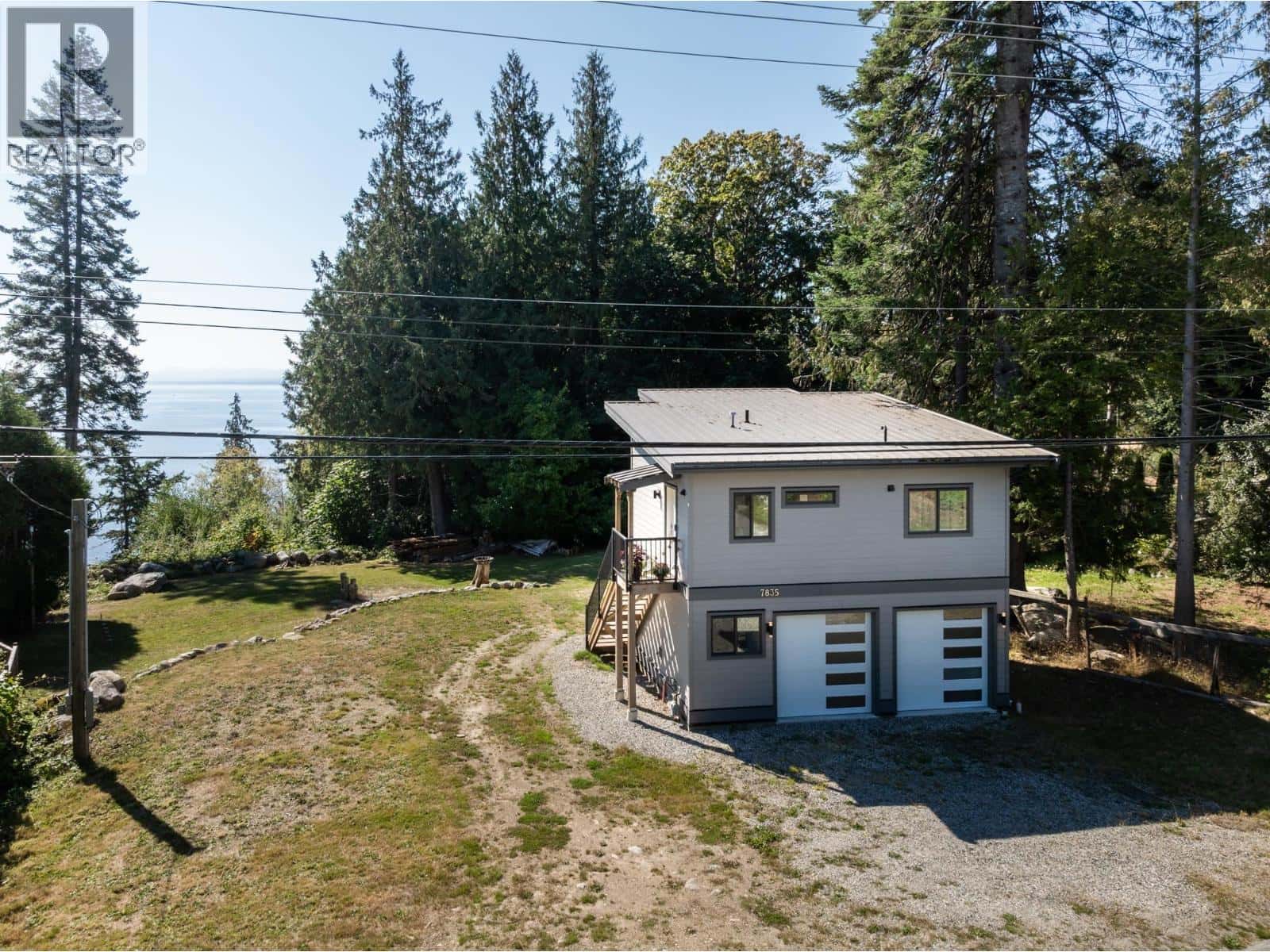 7835 REDROOFFS ROAD — Halfmoon Bay, British Columbia - Photo 4 of 40