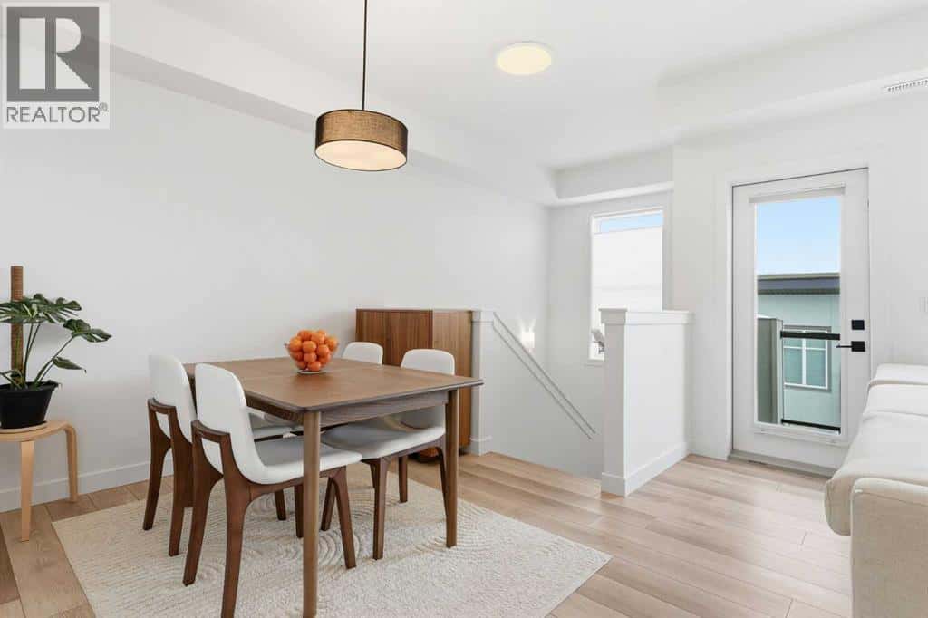 162 Spring Creek Common SW — Calgary, Alberta - Photo 5 of 21