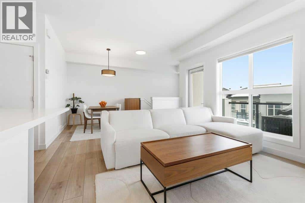 162 Spring Creek Common SW — Calgary, Alberta - Photo 2 of 21