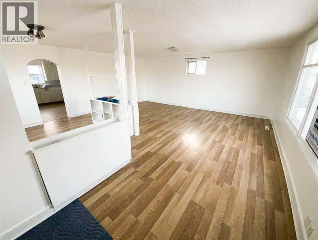 2111 19 Street — Nanton, Alberta - Photo 4 of 11