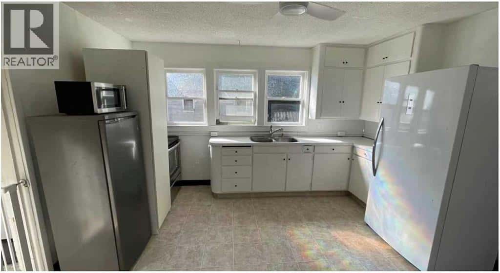 2111 19 Street — Nanton, Alberta - Photo 2 of 11