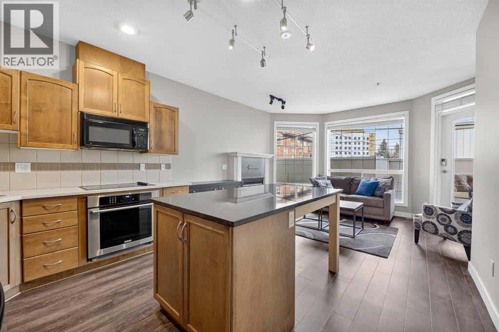 107, 3412 Parkdale Boulevard NW — Calgary, Alberta - Photo 4 of 23