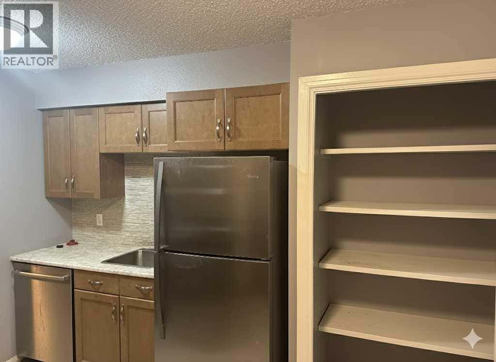 3105, 7201 Poplar Drive — Grande Prairie, Alberta - Photo 2 of 7