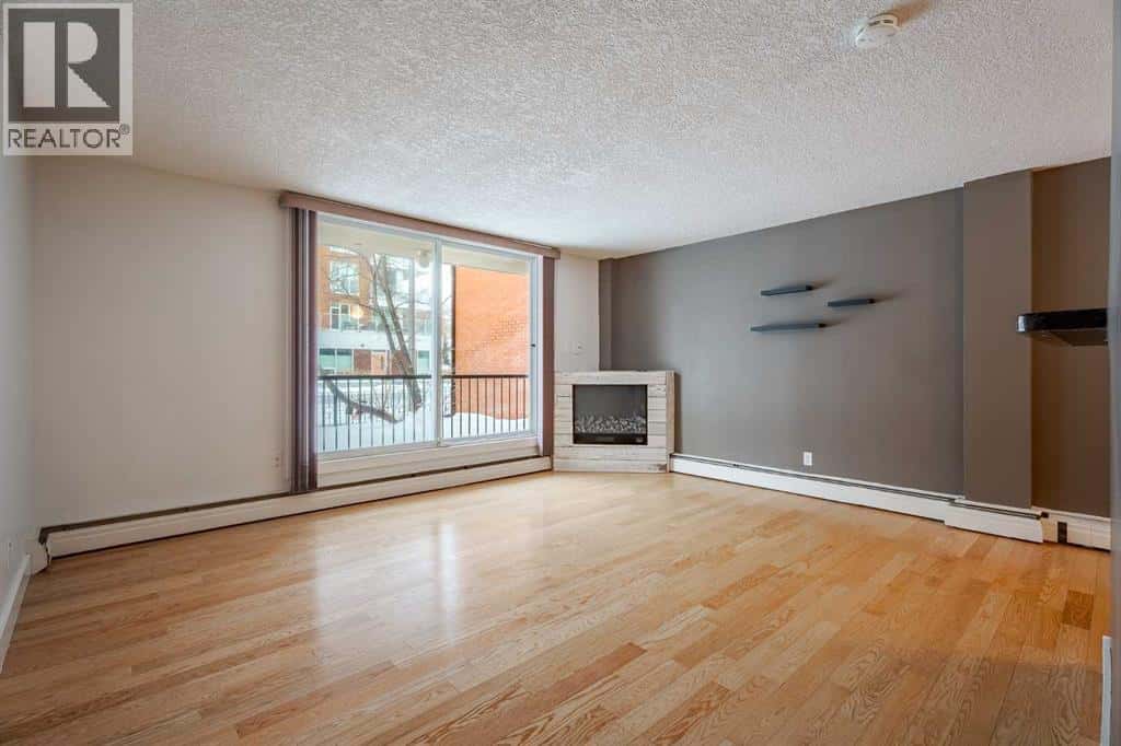 105, 934 2 Avenue NW — Calgary, Alberta - Photo 5 of 27