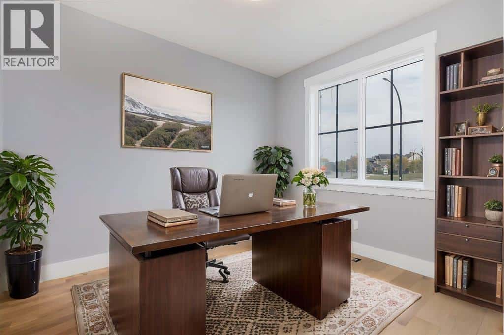 1209 Coopers Drive SW — Airdrie, Alberta - Photo 4 of 33